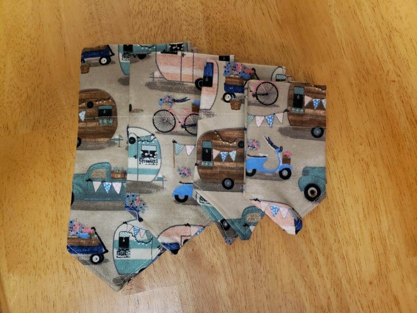 A wooden floor with some pictures of vehicles on it