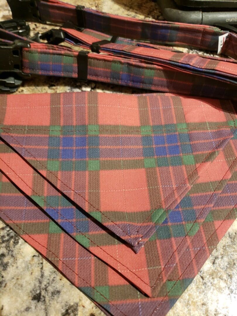 A table with some plaid napkins on it