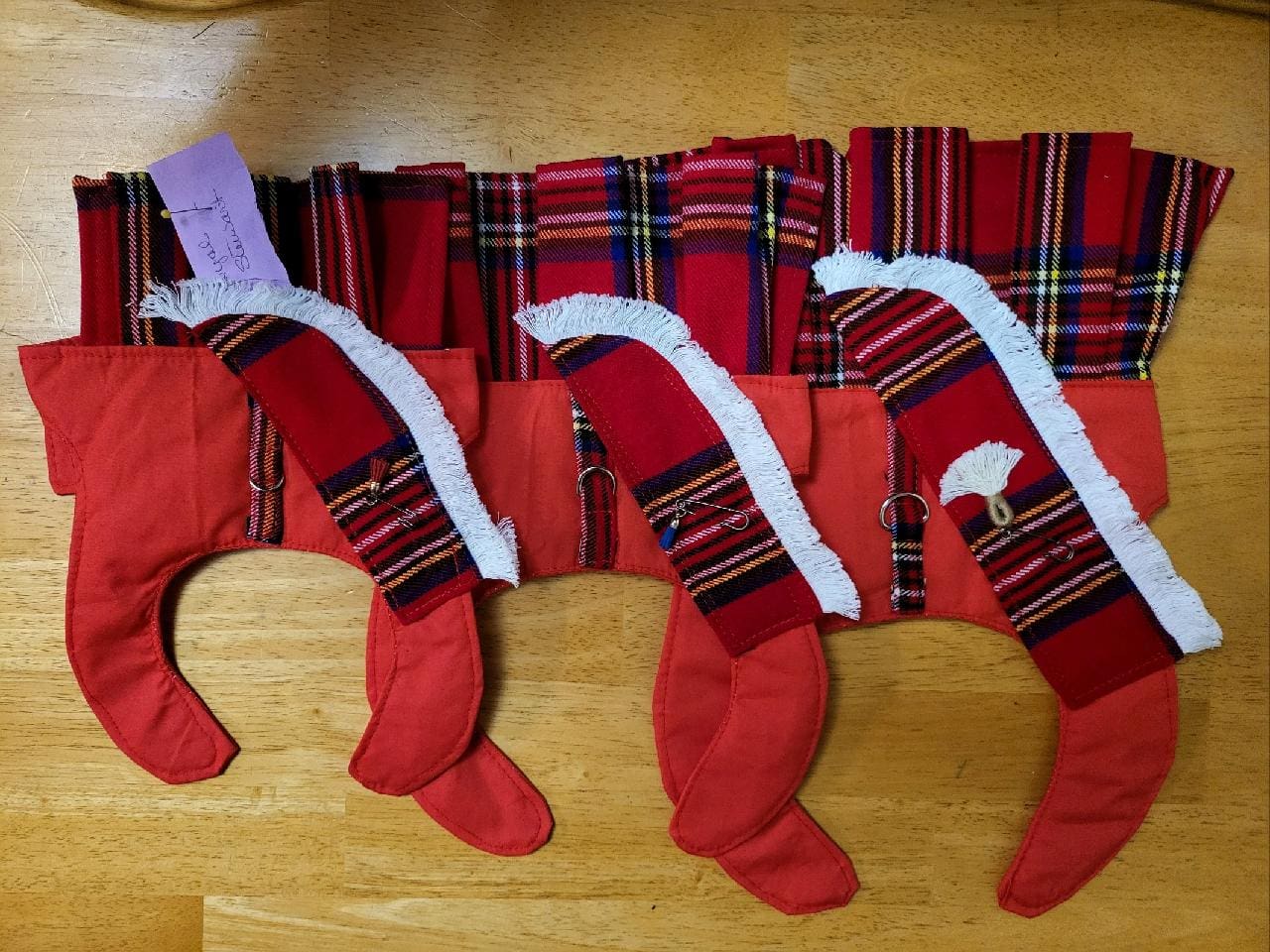 A wooden table with stockings on it