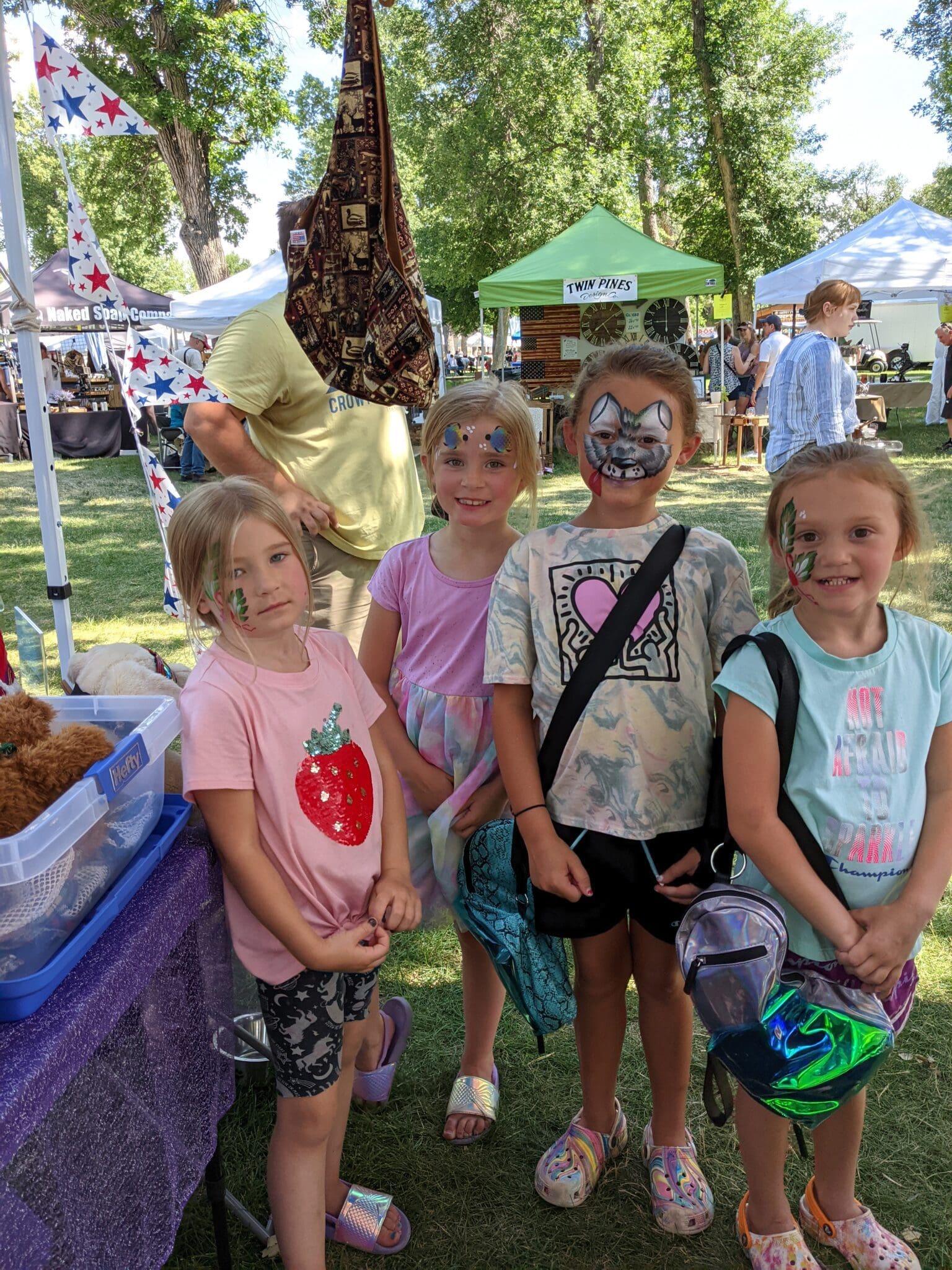 A group of children posing for the camera at an event.