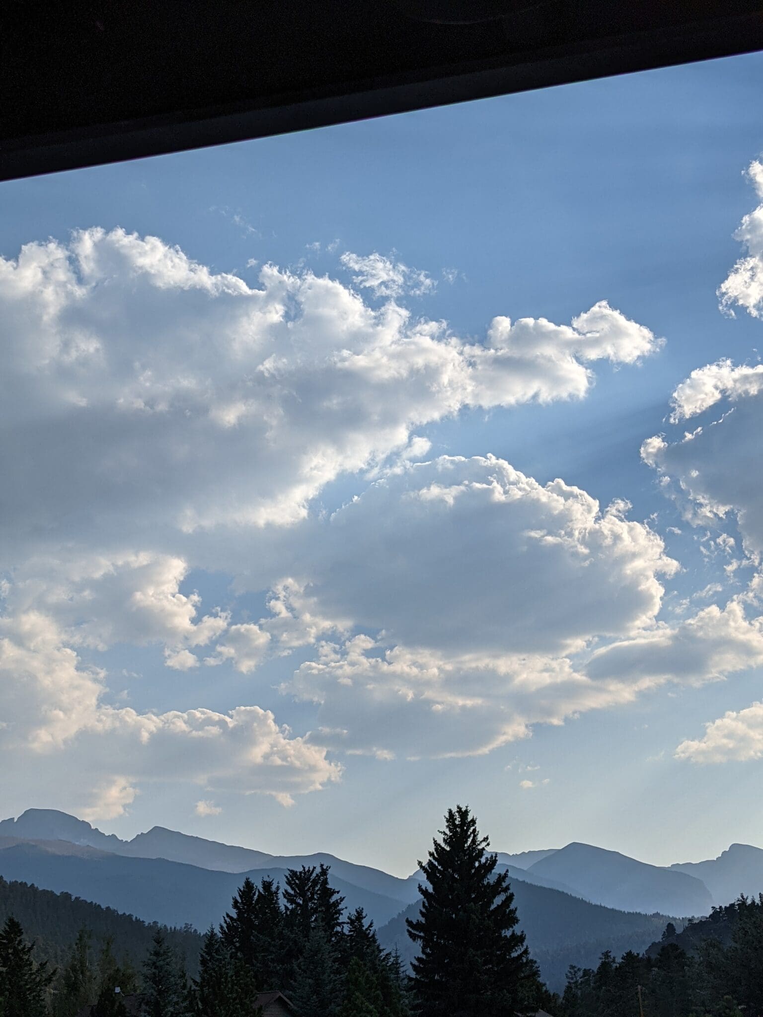 A view of some clouds in the sky.