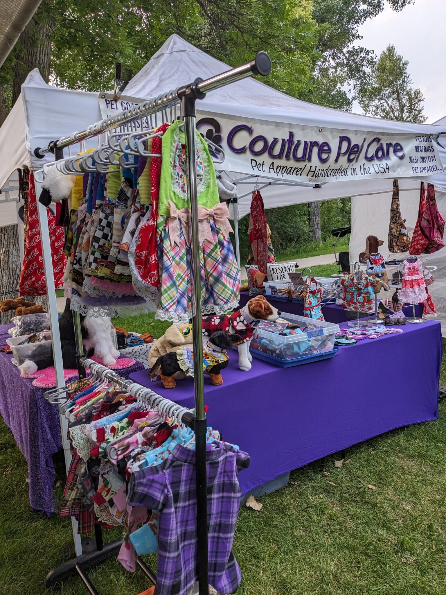 A purple tent with several different items on it.