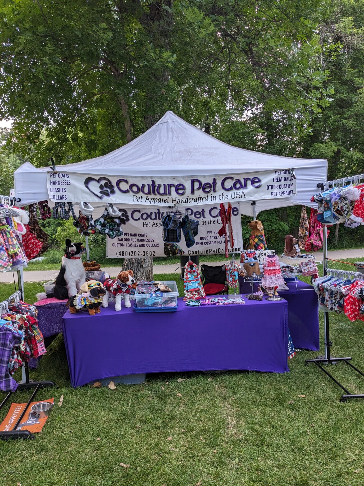 A purple tent with several different items on it.