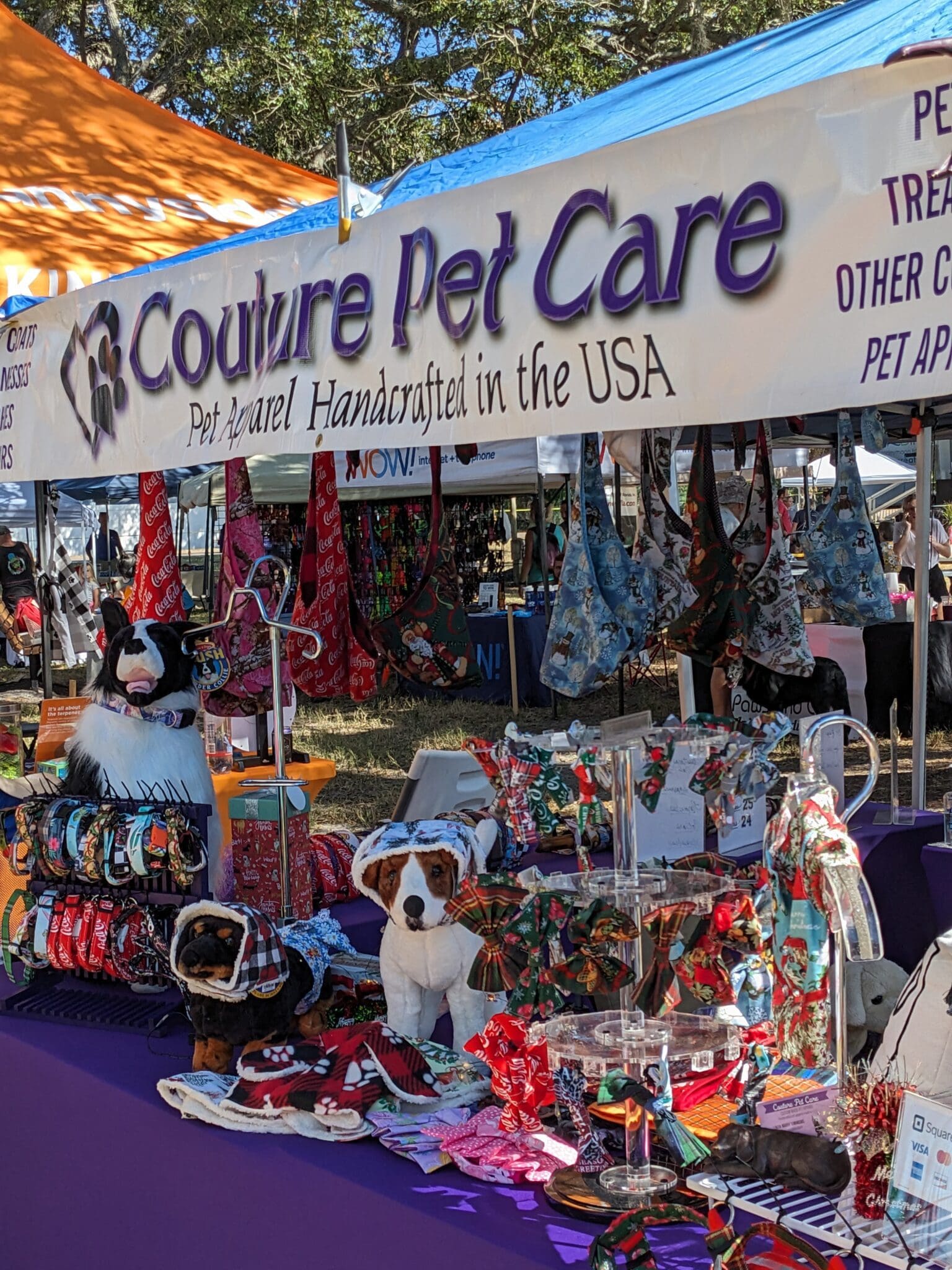 A vendor tent with several different items on display.